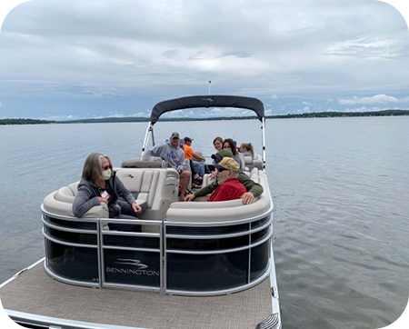 Don and family on the pontoon boat to fish.
