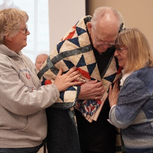 Honoring Those Who Serve: Quilts of Valor Celebrates HIA Hospice Veteran Volunteers