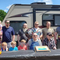 Glen with his family celebrating his 90th birthday