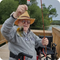Glen fishing with the help of Hospice