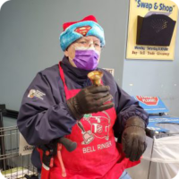 Glen volunteering ringing bells with the Salvation Army