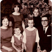 A young Glen with his wife and kids