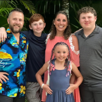 Brad and Sara Schenck on vacation with their three kids.